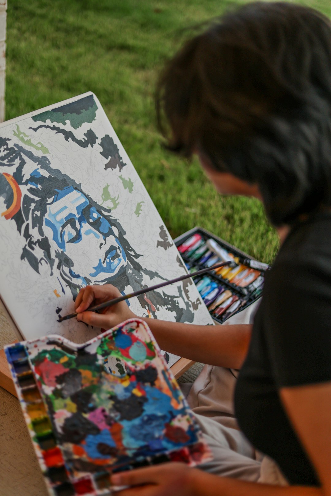 Artist working on canvas